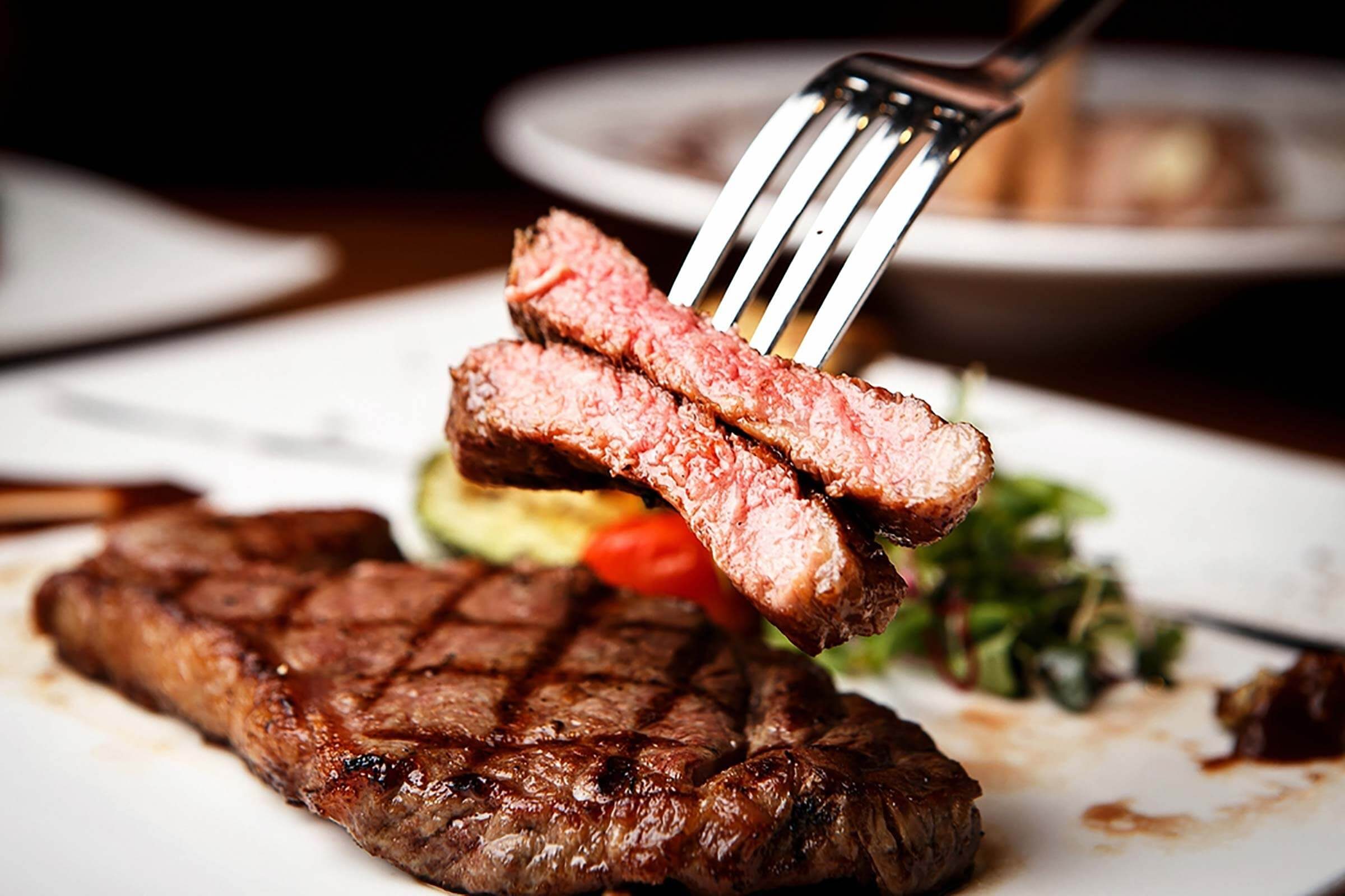 Steak fillet on a dinner plate.