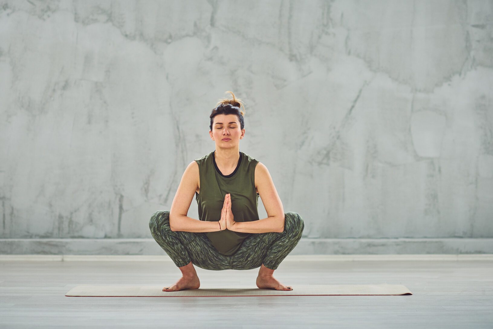Woman practicing yoga.