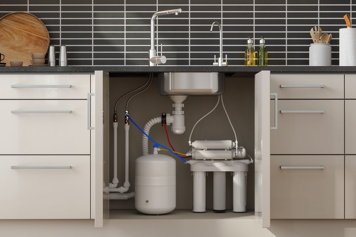 reverse osmosis filtration system in kitchen cabinet